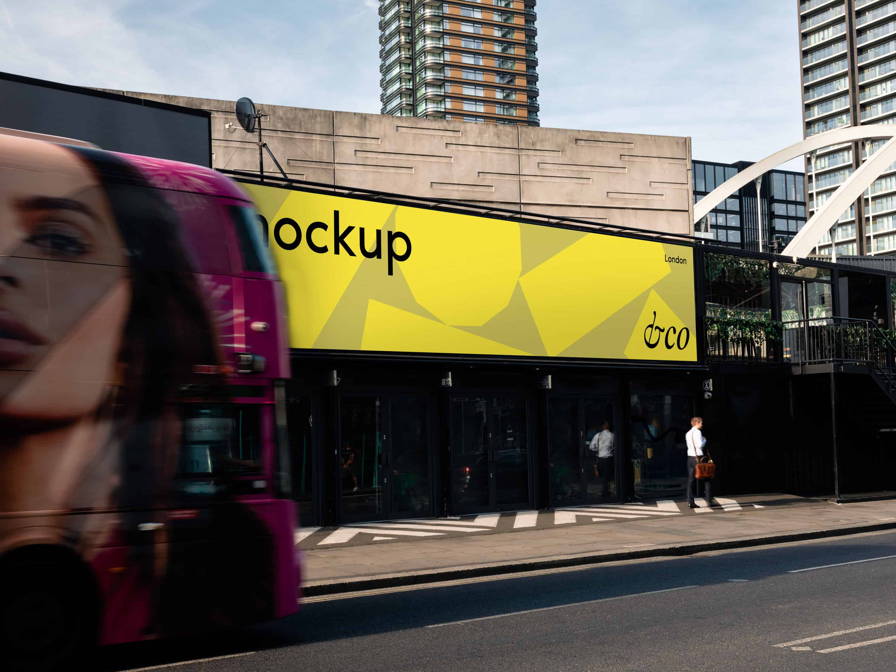 Billboard billboard mockup featuring a London cityscape with a London bus in the background, perfect for showcasing designs in an urban outdoor setting.
