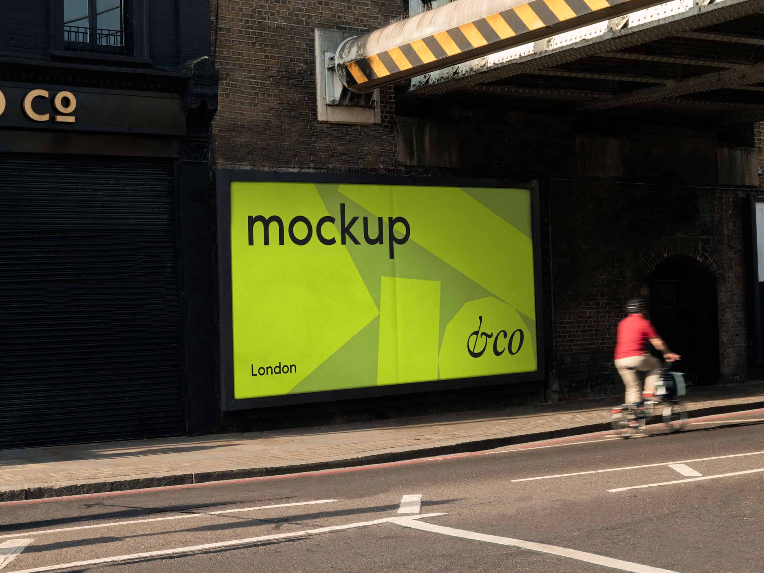 Customizable PSD billboard mockup featuring a Shoreditch street scene with space for your advertisement design
